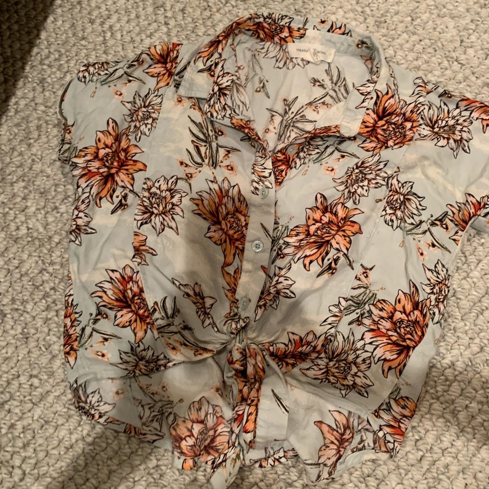 A cute crop top with a knot at the bottom